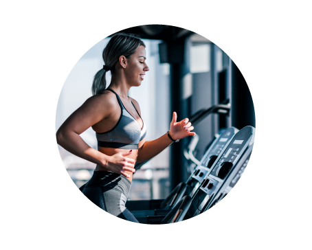 Image of woman running on at a gym to resemble in person training